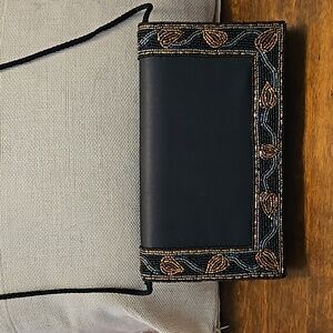 Evening bag with gold, grey and black beads